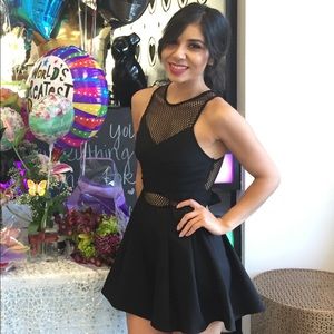 Luxxel Black Romper with Fishnet  and Tie Front